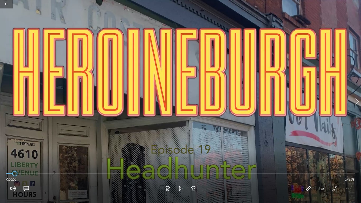 Heroineburgh Headhunter title frame.jpg