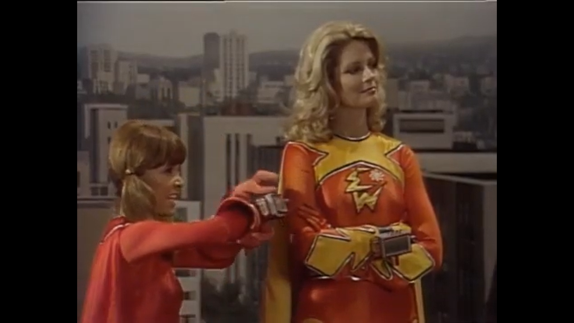 Dyna Girl Jumps Into Action, Electra Woman Watches...Again.png