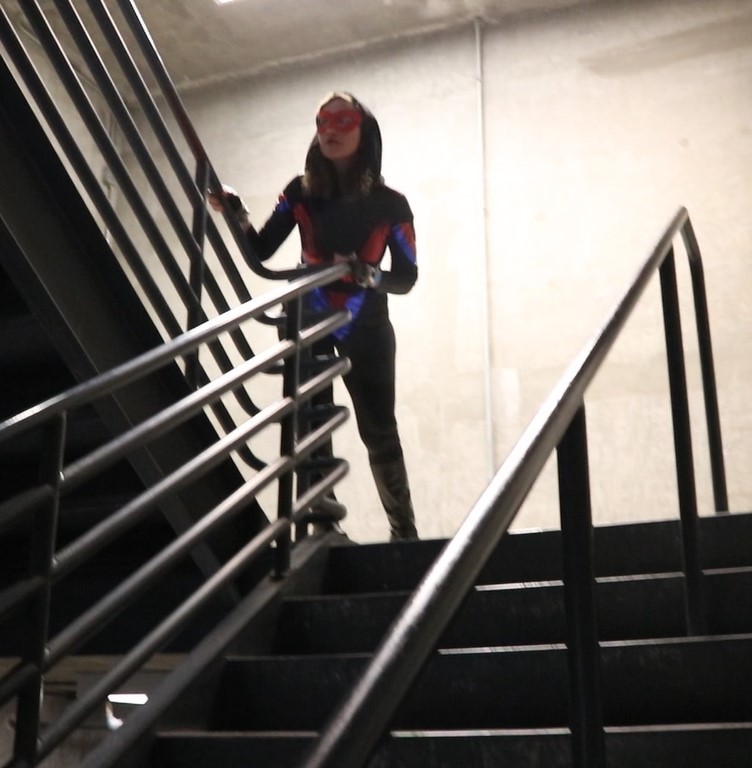 vigilanta pauses on the stairwell.jpg